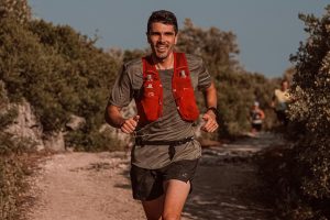 Smiling Man Running in Race